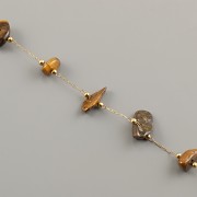 Řetízek se zlomky TYGŘÍ OKO metráž - ocel pozlacená